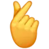 Hand With Index Finger And Thumb Crossed